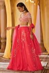 Shop_Zoon_Coral Net, Organza Embroidery, Tassels Sweetheart Neck Aari Lehenga Set _Online_at_Aza_Fashions