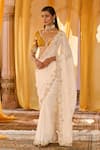 Buy_Zoon_Off White Chiffon, Net Embroidery, Sequins V-neck Aari Saree With Blouse _at_Aza_Fashions