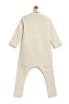 Shop Tiber Taber Cream Cotton Plain Kurta And Pyjama Set at Aza Fashions Shop_Tiber Taber_Cream Cotton Plain Kurta And Pyjama Set _at_Aza_Fashions