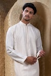 Shop_Darshika Menswear_Off White , Silk, Satin Pin Tuck Pattern Kurta Set _Online_at_Aza_Fashions