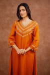 World of Sugandh_Orange Dupion, Silk Embroidery, Tassels V-neck Surkhiya Hand Kurta With Pant _Online_at_Aza_Fashions