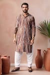Buy_Arihant Rai Sinha_Brown Viscose, Silk Swirl Print Kurta Set _at_Aza_Fashions