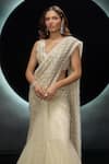 Couture By Niharika_Ivory Net Embroidery, Sequins V-neck Alvara Pre-draped Saree With Blouse _Online_at_Aza_Fashions