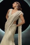 Shop_Couture By Niharika_Ivory Net Embroidery, Sequins V-neck Alvara Pre-draped Saree With Blouse _Online_at_Aza_Fashions