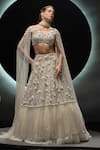 Shop Couture By Niharika Ivory Organza, Net Sequins, Beads, Veilora Hand Embroidered Lehenga With Bustier at Aza Fashions Shop_Couture By Niharika_Ivory Organza, Net Sequins, Beads, Veilora Hand Embroidered Lehenga With Bustier _at_Aza_Fashions