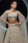 Couture By Niharika Ivory Organza, Net Sequins, Beads, Veilora Hand Embroidered Lehenga With Bustier at Aza Fashions Couture By Niharika_Ivory Organza, Net Sequins, Beads, Veilora Hand Embroidered Lehenga With Bustier _at_Aza_Fashions