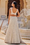 Shop Charu And Vasundhara Ivory Net Embroidery, Sequins, Stones, Beads, Metallic Keziah Lehenga Set at Aza Fashions Shop_Charu And Vasundhara_Ivory Net Embroidery, Sequins, Stones, Beads, Metallic Keziah Lehenga Set _at_Aza_Fashions