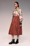 Kritika Murarka_Rust Cotton Striped Pleated Midi Skirt _Online_at_Aza_Fashions