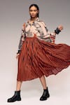 Buy_Kritika Murarka_Rust Cotton Striped Pleated Midi Skirt _at_Aza_Fashions