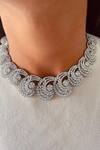 Buy_PRERTO_White Faux Diamonds, Stones Rounded Swirl Imitation Necklace Set_at_Aza_Fashions