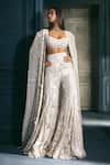 Buy_Ritika Mirchandani_Ivory Net, Crepe, Georgette Embroidery, Solenne Honey Comb Cape Sharara Set _at_Aza_Fashions