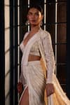 Shop_Ritika Mirchandani_Ivory Crepe, Georgette, Net Crystals, Embroidery Dove Lehenga Saree With Blouse _at_Aza_Fashions