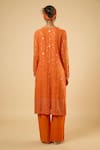 Shop_Dori & CO._Orange Georgette, Cotton Embroidery, Sequins, Pearls Keyhole Floral Kurta Set _at_Aza_Fashions