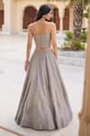 Shop_Charu And Vasundhara_Silver Tissue Embroidery, Sequins Krystabelle Embellished Corset Lehenga Set _at_Aza_Fashions