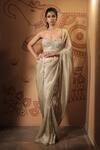 Buy_Vana Ethnics_Green Tissue Beads, Zari, The Nirvana Border Embellished Saree With Blouse _at_Aza_Fashions