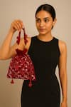 Shop_A Clutch Story_Maroon Beads, Sequins, Embroidery, Tassels Gulab Embellished Potli _at_Aza_Fashions