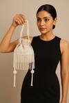 Shop_A Clutch Story_Ivory Beads, Fringe, Tassels Chandrika Embellished Potli _at_Aza_Fashions