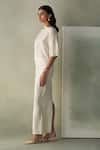 Febo6_Off White Silk Embroidery, Beads Round Neck Sicily Draped Blouse _at_Aza_Fashions
