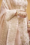Thetaa_Ivory Silk, Organza Embroidery, Metallic Thread V-neck Hand Lehenga Set _at_Aza_Fashions