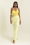 Shop_Pinup By Astha_Yellow Lycra Pom-poms Halter Neck Ruched Bust Cut-out Gown _Online_at_Aza_Fashions