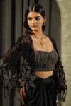 Muskan Aggarwal_Black Satin, Net Open Neck, Flore Patchwork Embroidered Cape Draped Skirt Set _at_Aza_Fashions