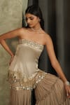 Muskan Aggarwal_Gold Satin, Silk, Georgette Mirrors, Crystals, Noore Peplum Top Gharara Set _at_Aza_Fashions