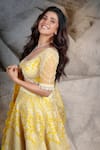 Archana Kochhar_Yellow Silk, Net Embroidery, Beads, Sequins, Pearls Marigold Resham Lehenga Set _at_Aza_Fashions