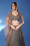 Archana Kochhar_Charcoal Net Sequins, Embroidery, Beads, Metallic The Midnight Hand Lehenga Set _at_Aza_Fashions