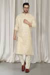 Buy_Aham-Vayam_Beige Cotton Mirrors, Embroidery Krishna Kurta And Pant Set _at_Aza_Fashions
