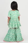 Shop Tiny Pants Green Georgette Foil Printing, Lace, Mirrors Peplum Kurta With Sharara at Aza Fashions Shop_Tiny Pants_Green Georgette Foil Printing, Lace, Mirrors Peplum Kurta With Sharara _at_Aza_Fashions