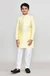 Petite Pomme_Yellow Silk Textured Kurta And Pant Set _at_Aza_Fashions