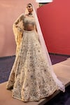 Buy Tamanna Punjabi Kapoor Ivory Silk, Net Embroidery, Sequins, Stones, Embellished Lehenga Blouse Set at Aza Fashions Buy_Tamanna Punjabi Kapoor_Ivory Silk, Net Embroidery, Sequins, Stones, Embellished Lehenga Blouse Set _at_Aza_Fashions