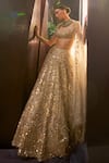 Shop Tamanna Punjabi Kapoor Gold Tissue Sequins, Mirrors, Zari, Beads, Embellished Lehenga Blouse Set at Aza Fashions Shop_Tamanna Punjabi Kapoor_Gold Tissue Sequins, Mirrors, Zari, Beads, Embellished Lehenga Blouse Set _at_Aza_Fashions