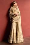 Buy_Tamanna Punjabi Kapoor_Ivory Tulle Beads, Sequins, Stones, Embroidery Embellished Kurta Sharara Set _at_Aza_Fashions