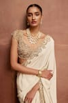 Tamanna Punjabi Kapoor Ivory Crepe Zari, Stones, Beads, Sequins, Embroidery, Border Saree With Blouse Online at Aza Fashions Tamanna Punjabi Kapoor_Ivory Crepe Zari, Stones, Beads, Sequins, Embroidery, Border Saree With Blouse _Online_at_Aza_Fashions
