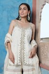 Nazar By Indu Ivory Cotton Mirrors, Embroidery, Gota Patti Scoop Strappy Kurta Sharara Set at Aza Fashions Nazar By Indu_Ivory Cotton Mirrors, Embroidery, Gota Patti Scoop Strappy Kurta Sharara Set _at_Aza_Fashions