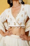 Nazar By Indu Ivory Cotton Embroidery, Sequins, Tassels Blouse And Motif Flared Lehenga Set Online at Aza Fashions Nazar By Indu_Ivory Cotton Embroidery, Sequins, Tassels Blouse And Motif Flared Lehenga Set _Online_at_Aza_Fashions