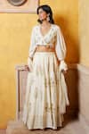 Shop Nazar By Indu Ivory Cotton Embroidery, Sequins, Tassels Blouse And Motif Flared Lehenga Set Online at Aza Fashions Shop_Nazar By Indu_Ivory Cotton Embroidery, Sequins, Tassels Blouse And Motif Flared Lehenga Set _Online_at_Aza_Fashions