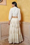 Shop Nazar By Indu Ivory Cotton Embroidery, Sequins, Tassels Blouse And Motif Flared Lehenga Set at Aza Fashions Shop_Nazar By Indu_Ivory Cotton Embroidery, Sequins, Tassels Blouse And Motif Flared Lehenga Set _at_Aza_Fashions