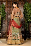 Shop_Amaltas Couture_Green Crepe, Net Embroidery, Beads, Stones, Dori Marodi Work Lehenga Set _at_Aza_Fashions
