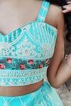 Amaltas Couture_Sky Blue Net Embroidery, Sequins, Zari Sweetheart Neck Thread Lehenga Set _Online_at_Aza_Fashions