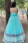 Shop_Amaltas Couture_Sky Blue Net Embroidery, Sequins, Zari Sweetheart Neck Thread Lehenga Set _at_Aza_Fashions