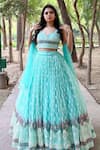 Amaltas Couture_Sky Blue Net Embroidery, Sequins, Zari Sweetheart Neck Thread Lehenga Set _at_Aza_Fashions