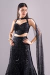 Samyukta Singhania Black Net Sequins, Embroidery Sweetheart Neck, Geometric Hand Lehenga Set at Aza Fashions Samyukta Singhania_Black Net Sequins, Embroidery Sweetheart Neck, Geometric Hand Lehenga Set _at_Aza_Fashions