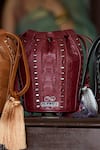 Shop_Araani Design_Maroon Embroidery, Tassels, Studs Sheesham Textured And Hand Potli _at_Aza_Fashions