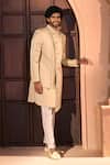 Arihant Rai Sinha_Beige Silk, Dupion Embroidery, Beads, Sequins Placed Layered Sherwani Set 