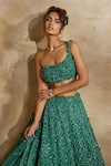 Nitika Gujral Green Net, Satin Beads, Sequins, Crystals, Forest Embellished Lehenga Set at Aza Fashions Nitika Gujral_Green Net, Satin Beads, Sequins, Crystals, Forest Embellished Lehenga Set _at_Aza_Fashions