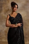 Nitika Gujral_Black Georgette, Satin Sequins, Beads, Tonal Embellished Saree With Blouse _at_Aza_Fashions