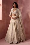 Buy_Nitika Gujral_Cream Organza, Net, Satin Embroidery, Sequins, Beads, Floral Pattern Lehenga Set _at_Aza_Fashions