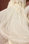 Buy Nitika Gujral Ivory Chiffon, Satin, Organza Pearls, Fringe Halter Pleated Skirt And Blouse Set Online at Aza Fashions Buy_Nitika Gujral_Ivory Chiffon, Satin, Organza Pearls, Fringe Halter Pleated Skirt And Blouse Set _Online_at_Aza_Fashions
